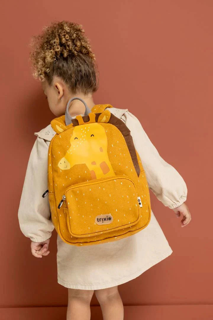 Open main compartment of Trixie Mr. Giraffe backpack showing interior space