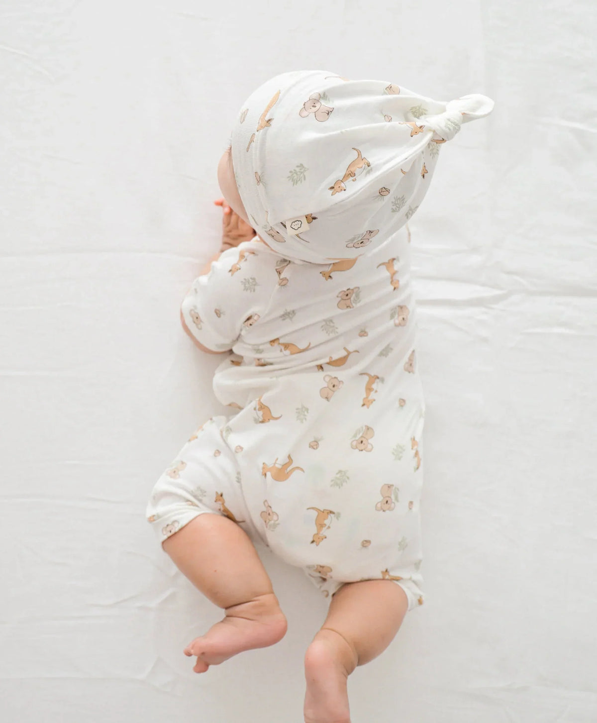 Lummi in Colour bamboo zip romper in the Kangaroo and Koala print