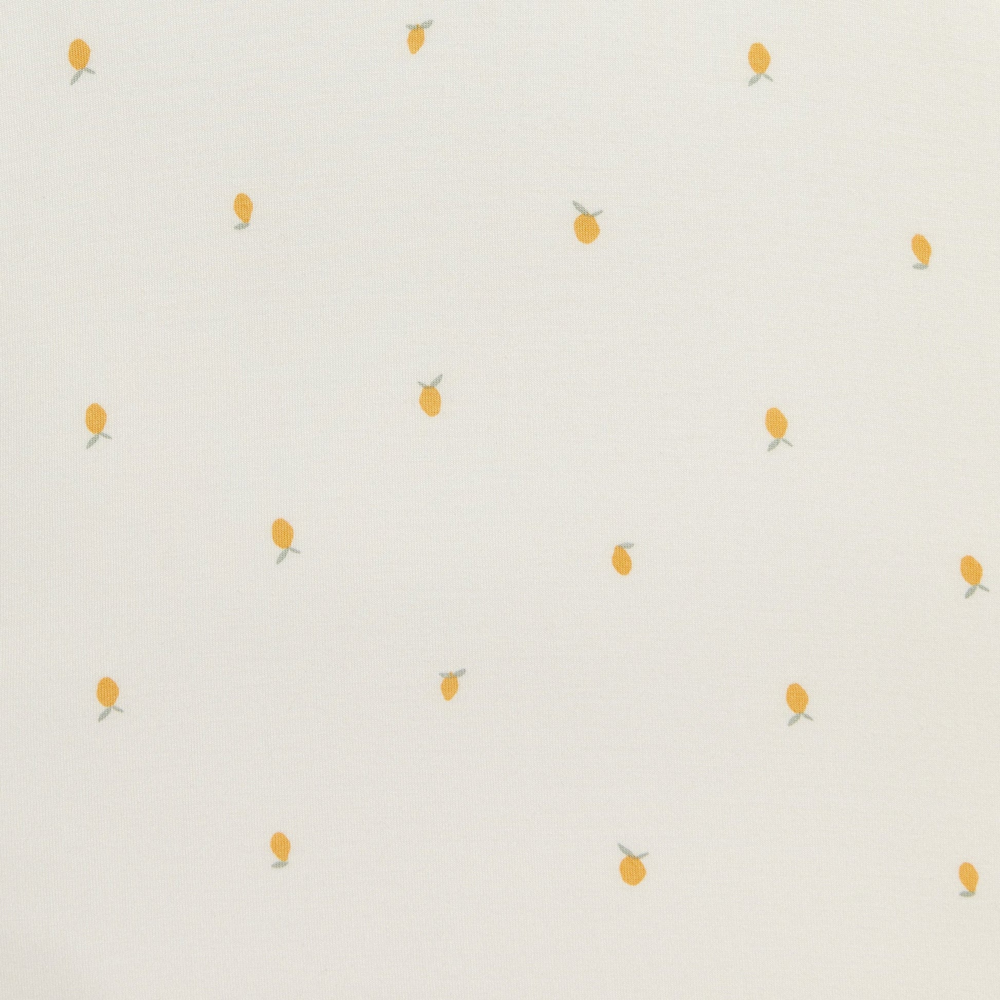 Baby settled in Love to Dream Swaddle Up 1.0 TOG Bamboo Cream Lemons
