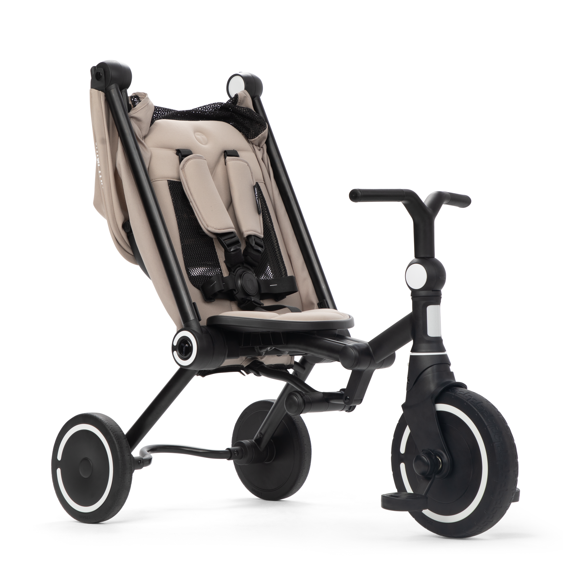Toddler riding the smarTrike Wonder Max Stone Beige independently in free riding mode
