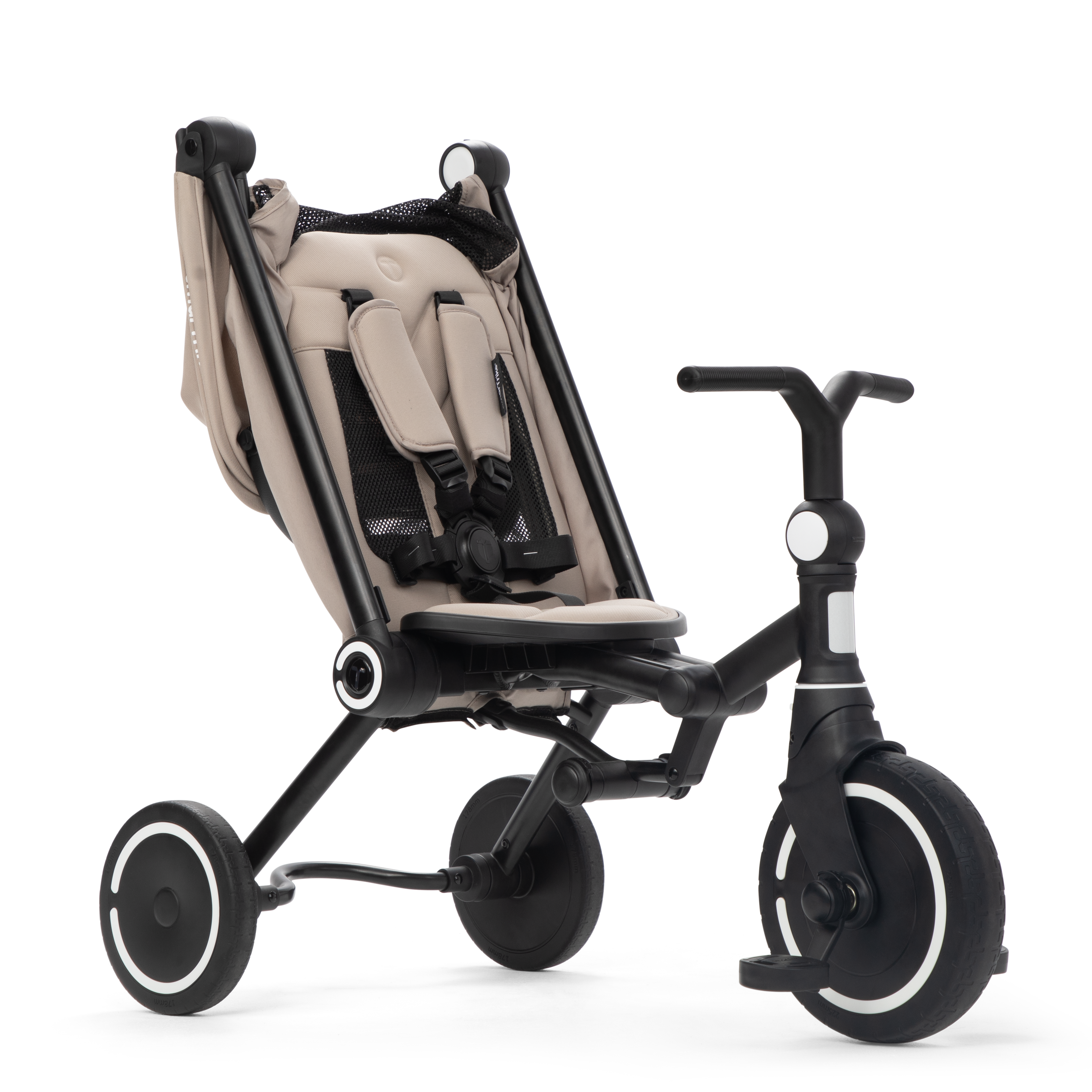 Toddler riding the smarTrike Wonder Max Stone Beige independently in free riding mode