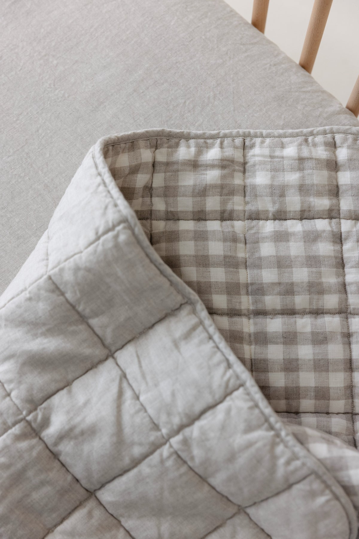 Linen Label rectangle blanket shown as a play mat on the floor