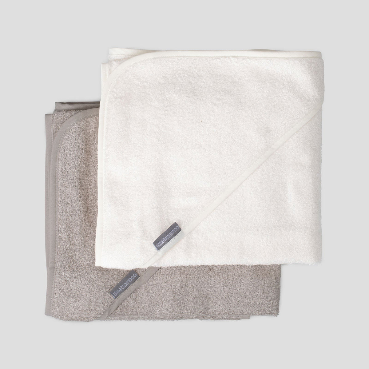 Baby wrapped in a Little Bamboo Stone Grey hooded towel