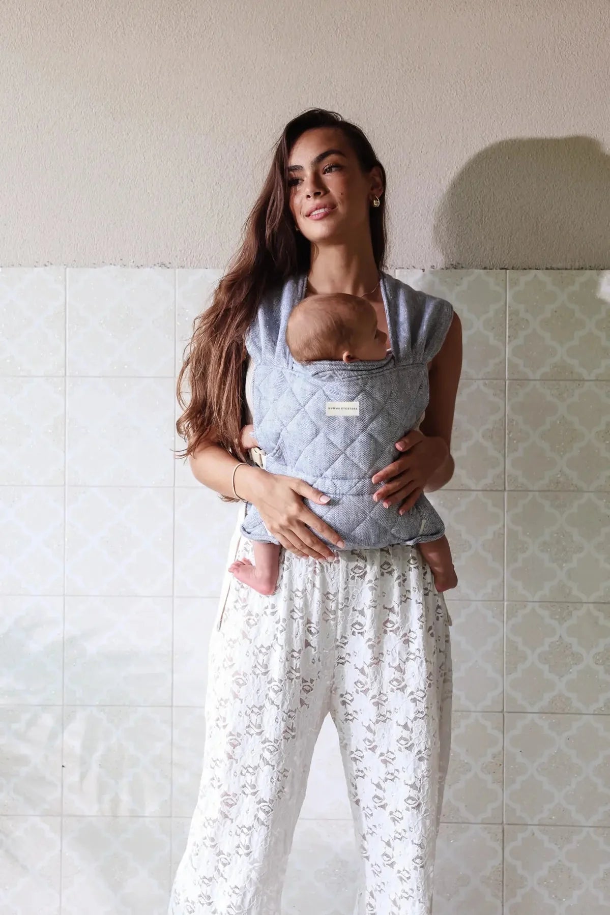 Mumma Etcetera Daily Carrier Lane with newborn, showing cross-back straps