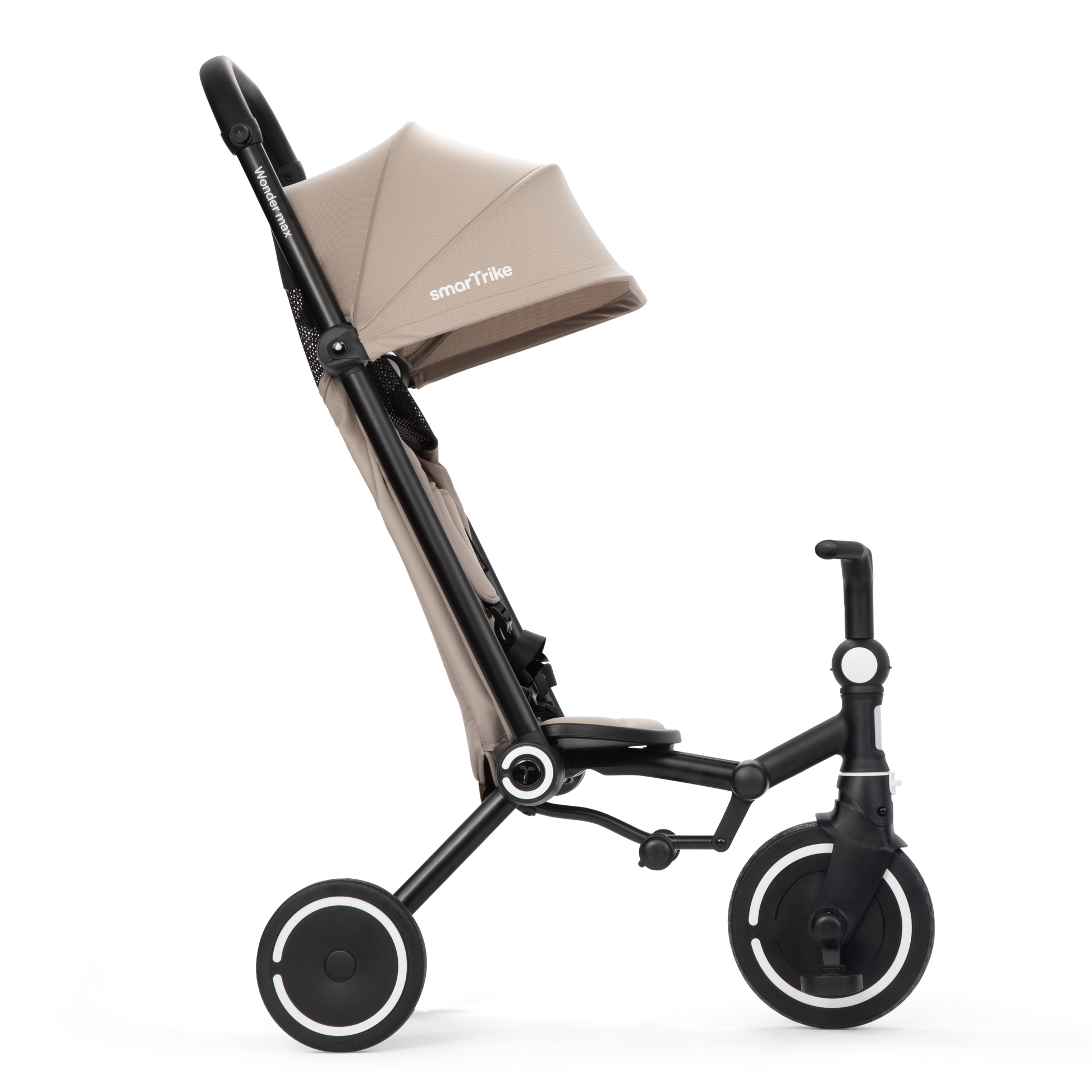 smarTrike Wonder Max Stone Beige in trike mode, child holds handlebars while parent steers