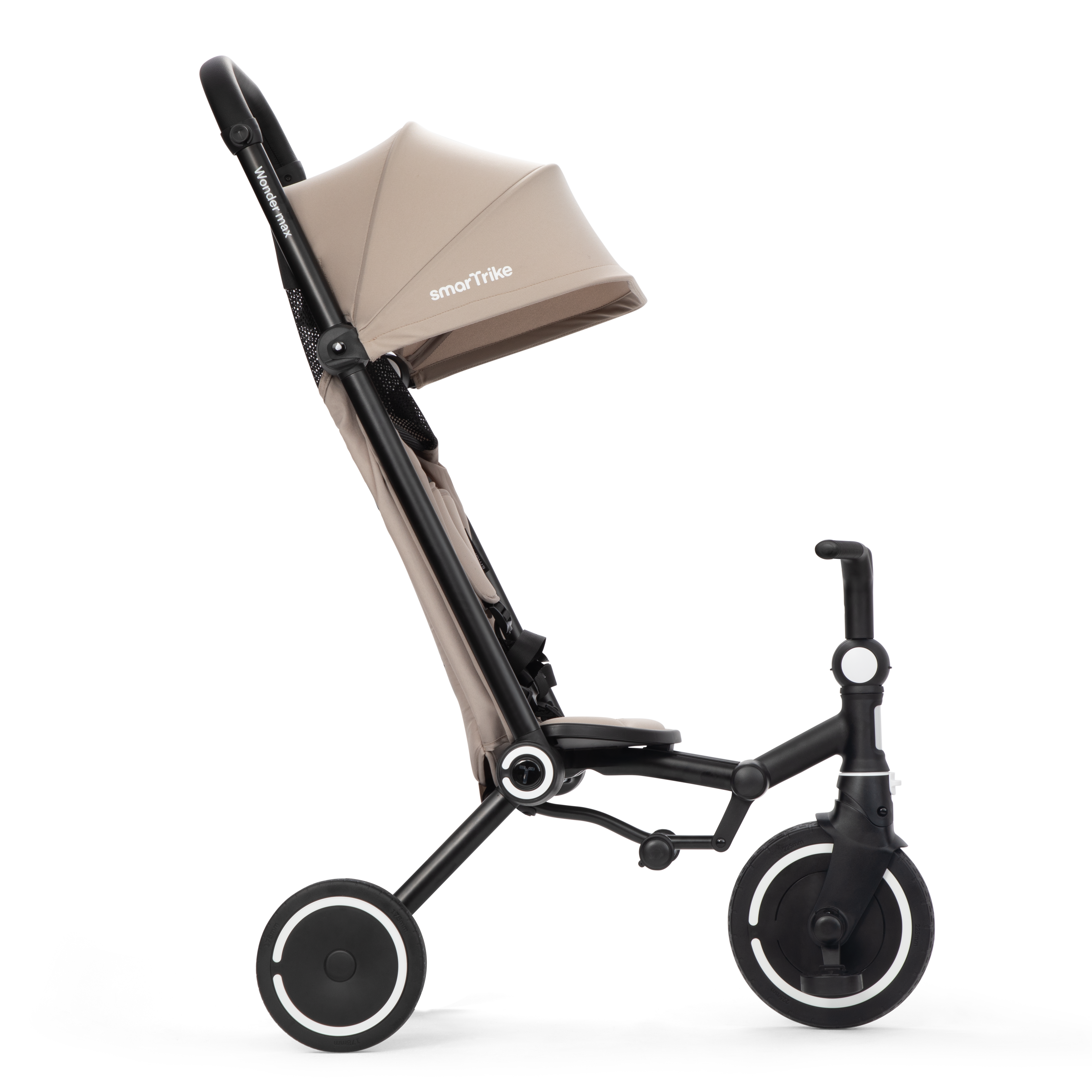 smarTrike Wonder Max Stone Beige in trike mode, child holds handlebars while parent steers