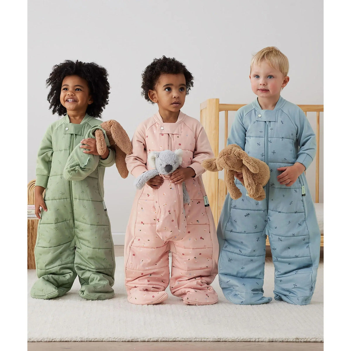 Toddler in the ergoPouch Sleep Suit Bag from the Heritage collection at bedtime