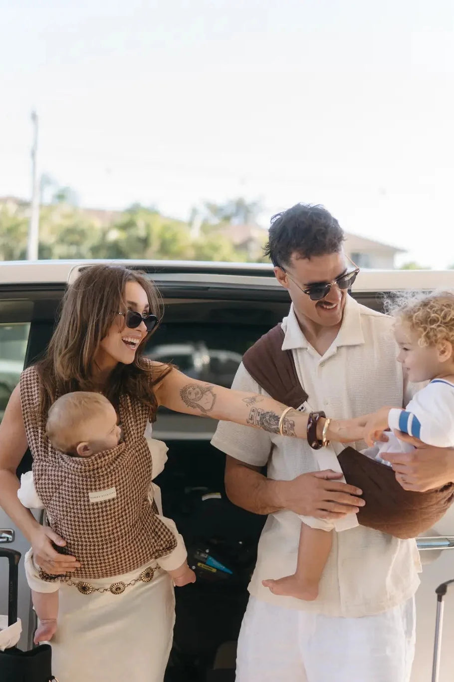 Lifestyle shot of parent and toddler using the Coco Hipsy Carrier