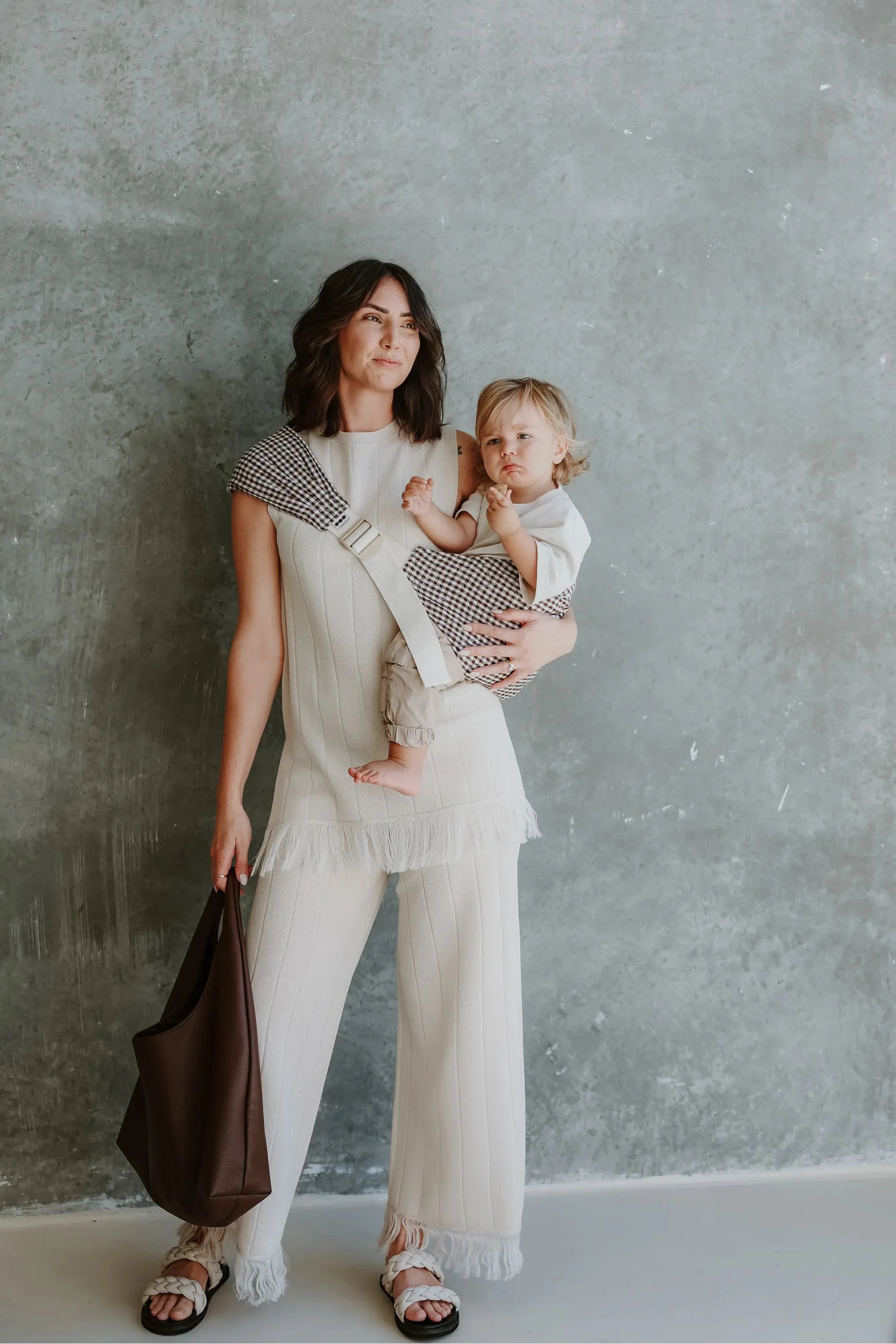 Toddler hip carry in the Mumma Etcetera Hipsy Carrier Elston gingham