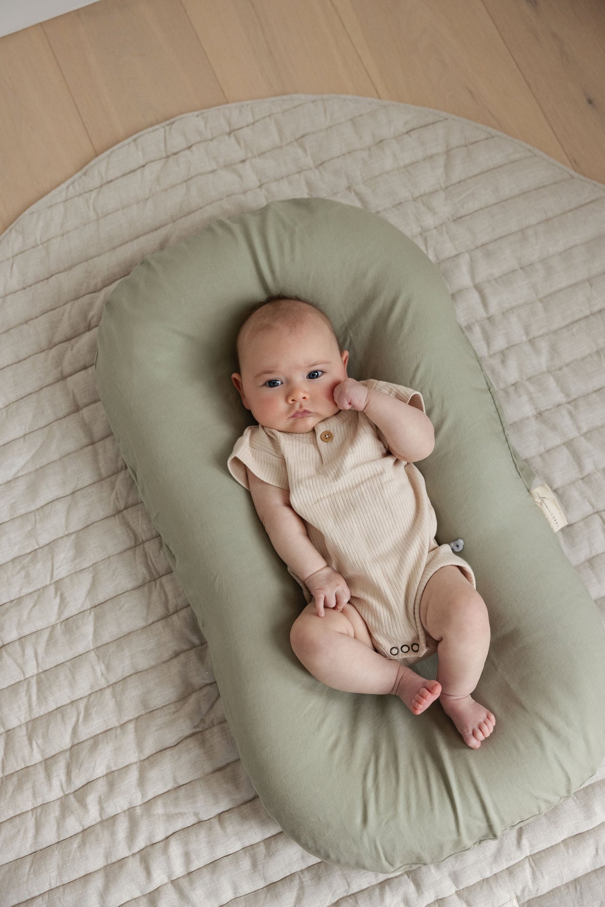 Linen Label baby lounger nest with Soft Sage pure linen cover