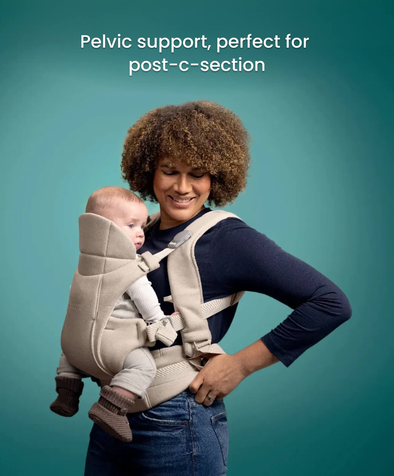 Kudo Baby Carrier Cashmere — 100% recycled polyester in lifestyle setting, warm neutral tone