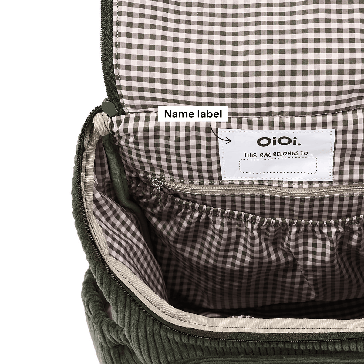 OiOi Signature Kids Backpack internal name label detail (shown in Moss Green)