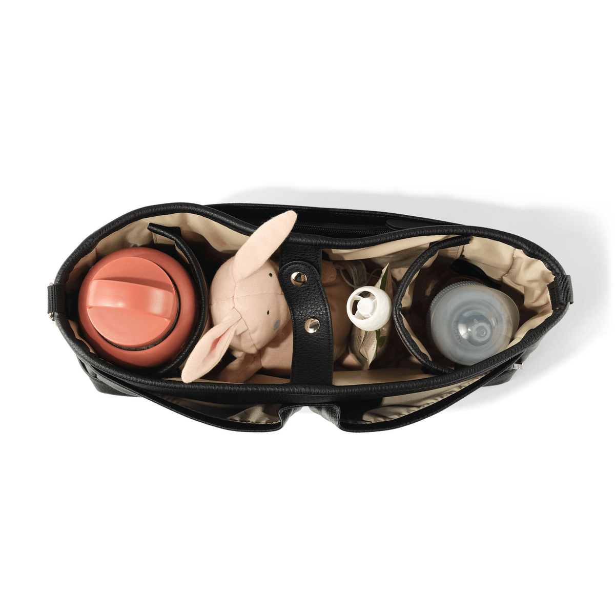 OiOi Signature Pram Caddy black packed with nappies bottle and essentials