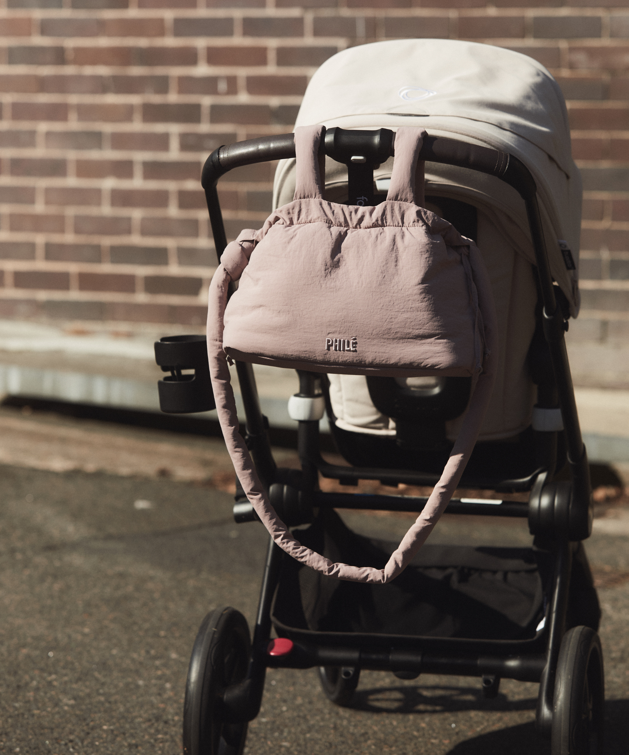Philé Pram Caddy in Dusty Rose, full product flat lay