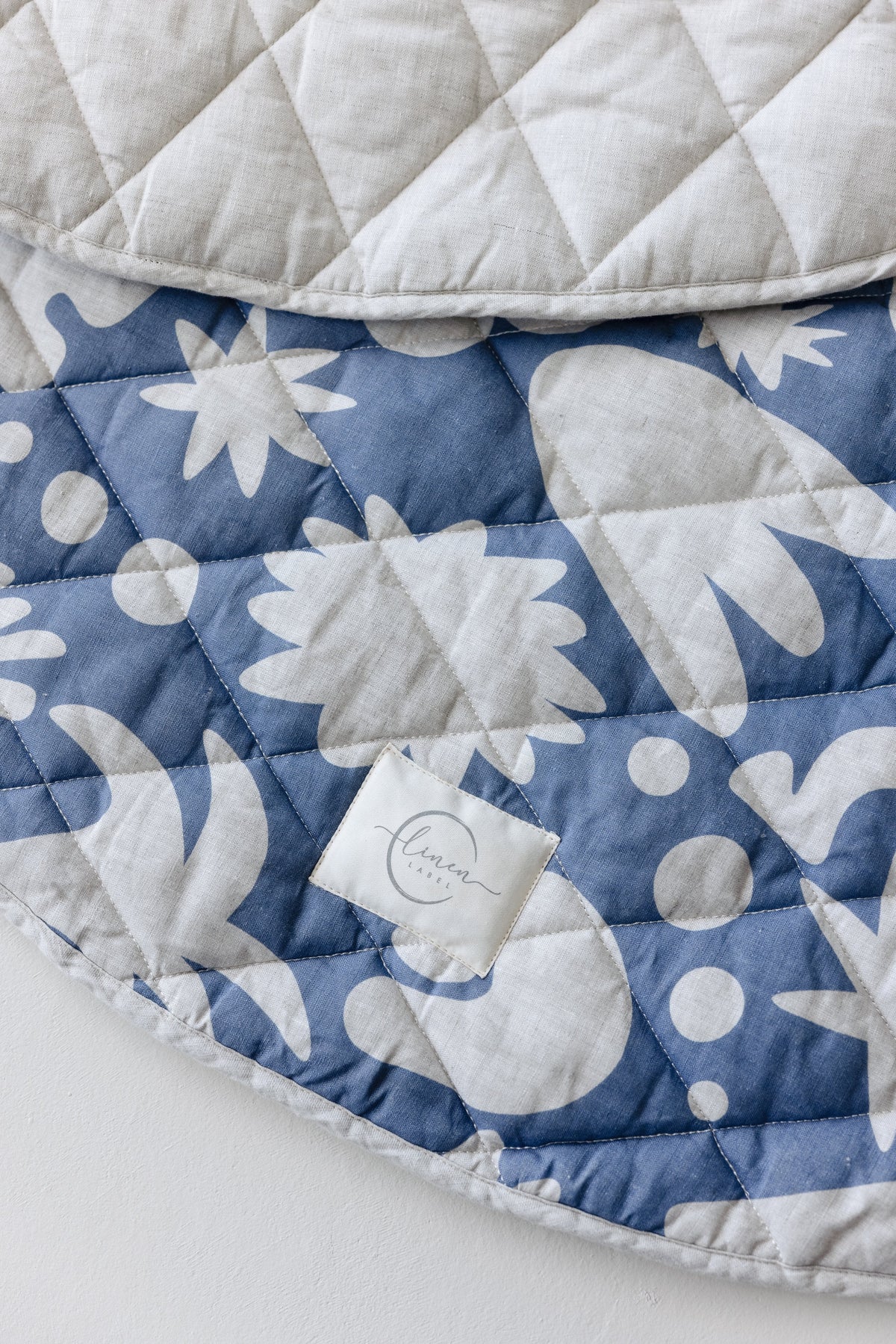 Linen Label round padded linen play mat in Denim Blue Print