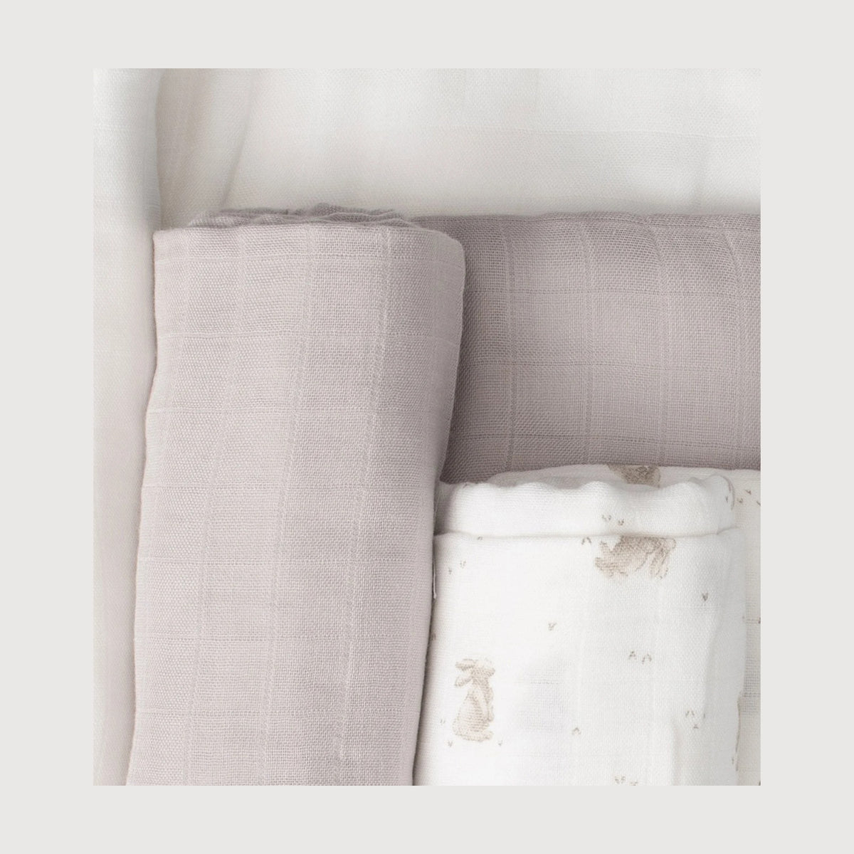 Baby swaddled in a Little Bamboo muslin wrap