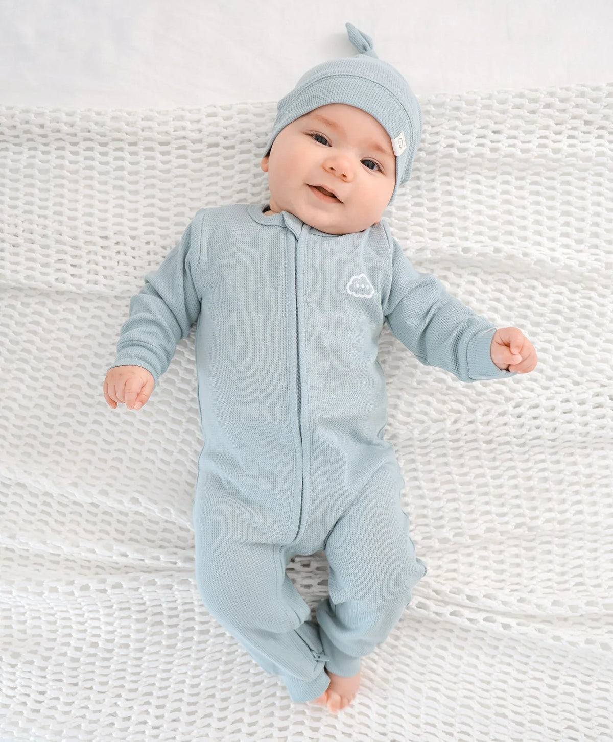 Lummi in Colour waffle beanie worn by a newborn
