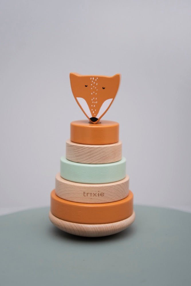 Side view of Trixie Mr. Fox wooden ring stacker showing curved wobble base
