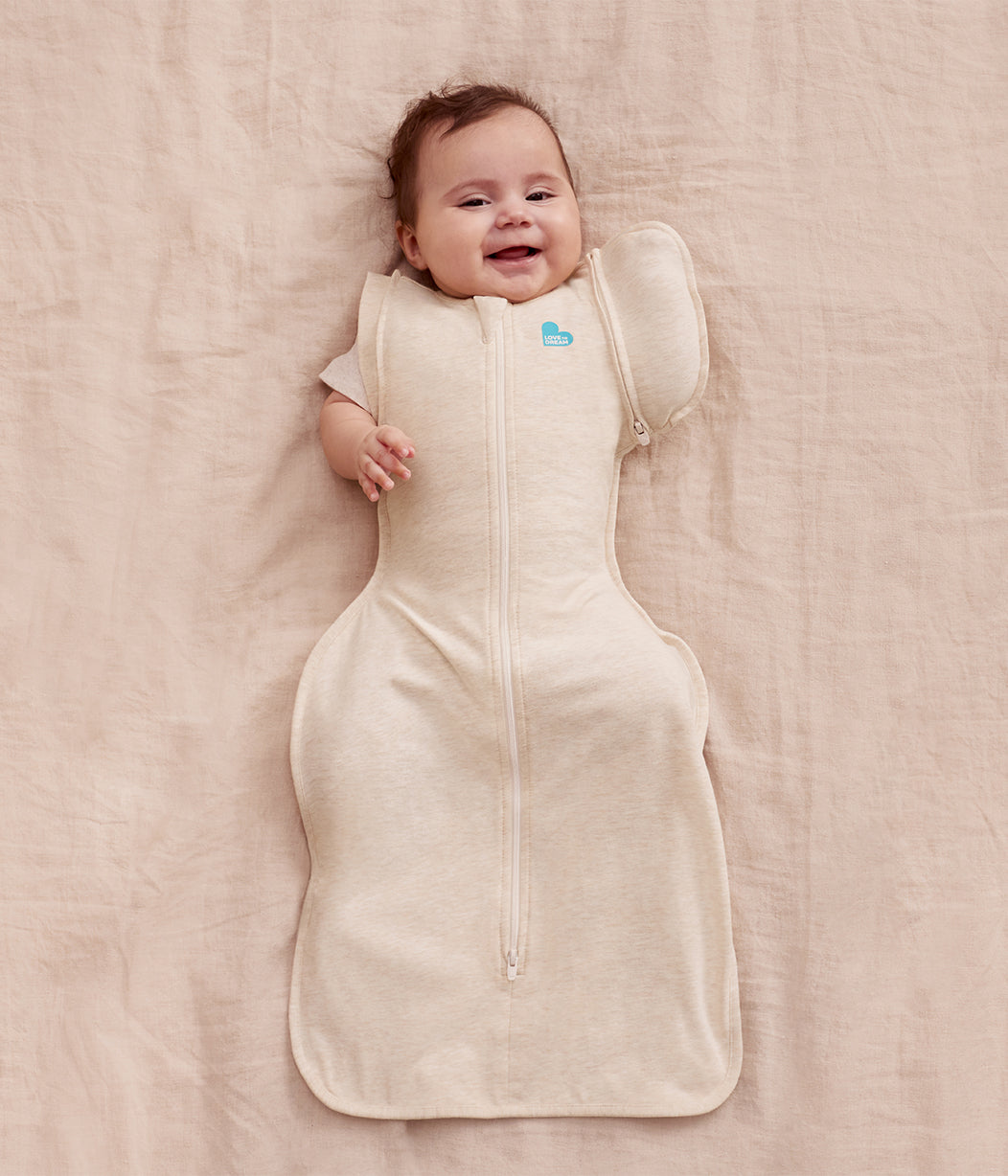 Love to Dream 2-in-1 Early Roller Transition Bag 1.0 TOG Oatmeal — full swaddle both wings on