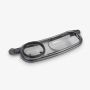 UPPAbaby Snack Tray fitted to a pram bumper bar, showing the recessed snack bowl and formed cup holder